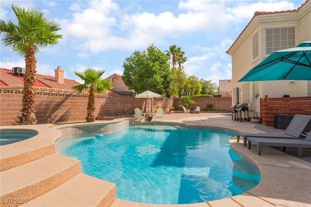 8605 Trianon Ln, Las Vegas, NV 89145 - view of pool featuring an in-ground hot tub, a patio area, a fenced backyard, and grilling area