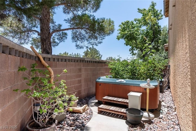 10352 Natural Springs Ave, Las Vegas, NV 89129 - fenced backyard featuring a hot tub
