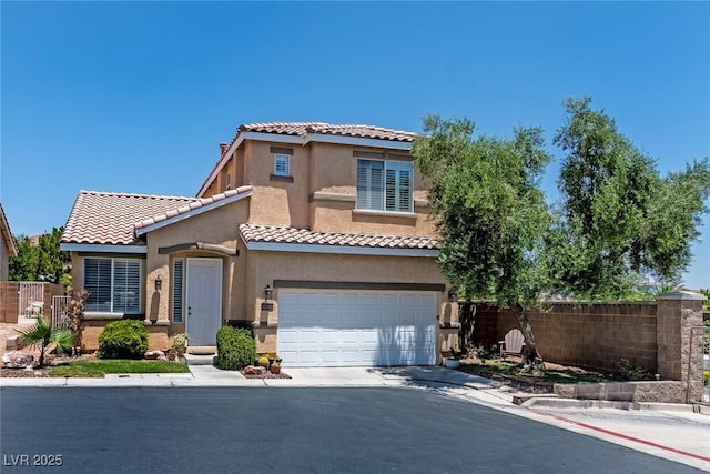10352 Natural Springs Ave, Las Vegas, NV 89129 - view of front of house featuring stucco siding, a garage, driveway, and a tiled roof