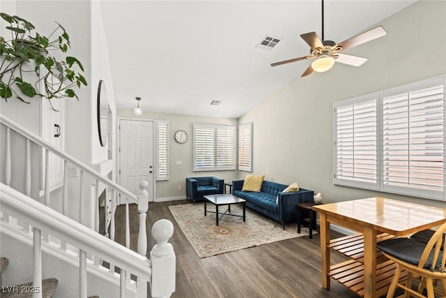 10352 Natural Springs Ave, Las Vegas, NV 89129 - living room with vaulted ceiling, wood finished floors, stairs, and ceiling fan