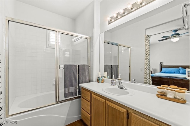 10352 Natural Springs Ave, Las Vegas, NV 89129 - full bath with ensuite bath, combined bath / shower with glass door, vanity, and a ceiling fan