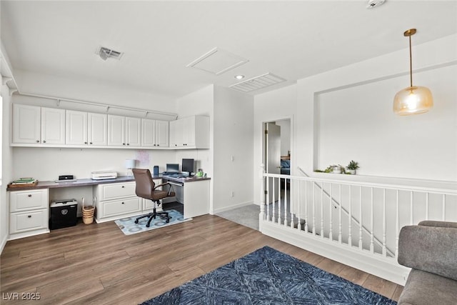 10352 Natural Springs Ave, Las Vegas, NV 89129 - office area featuring built in desk and wood finished floors