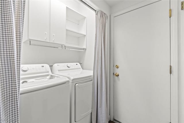10352 Natural Springs Ave, Las Vegas, NV 89129 - laundry area featuring cabinet space and washer and clothes dryer
