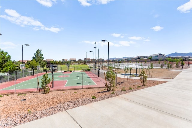 10160 Tree Blossom Ave, Las Vegas, NV 89166 - view of tennis court with community basketball court