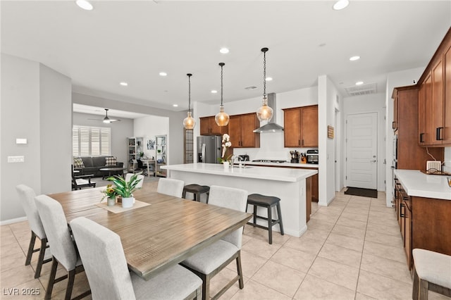 10160 Tree Blossom Ave, Las Vegas, NV 89166 - dining room with recessed lighting and light tile patterned flooring
