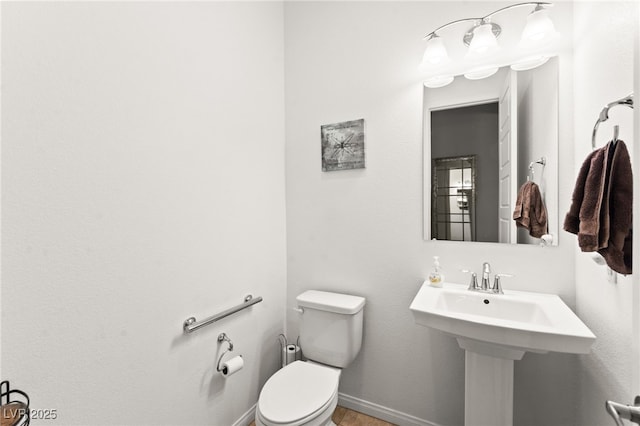 10160 Tree Blossom Ave, Las Vegas, NV 89166 - half bath featuring toilet and baseboards