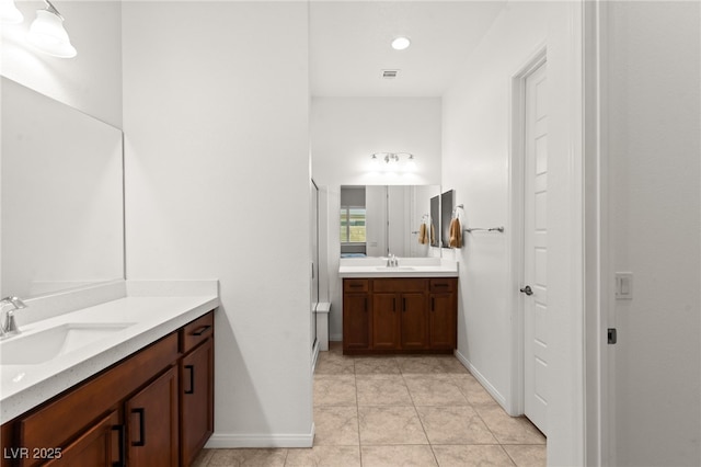 10160 Tree Blossom Ave, Las Vegas, NV 89166 - bathroom with vanity and tile patterned floors