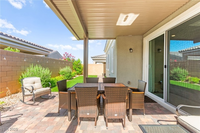 10160 Tree Blossom Ave, Las Vegas, NV 89166 - fenced backyard featuring a patio and outdoor dining space