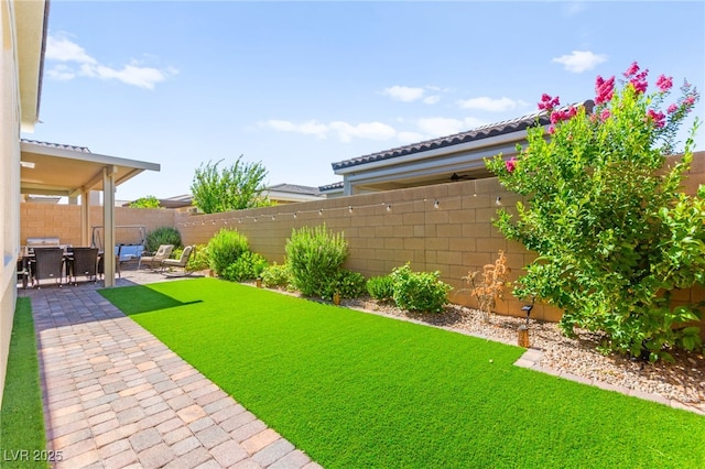 10160 Tree Blossom Ave, Las Vegas, NV 89166 - fenced backyard with a patio area