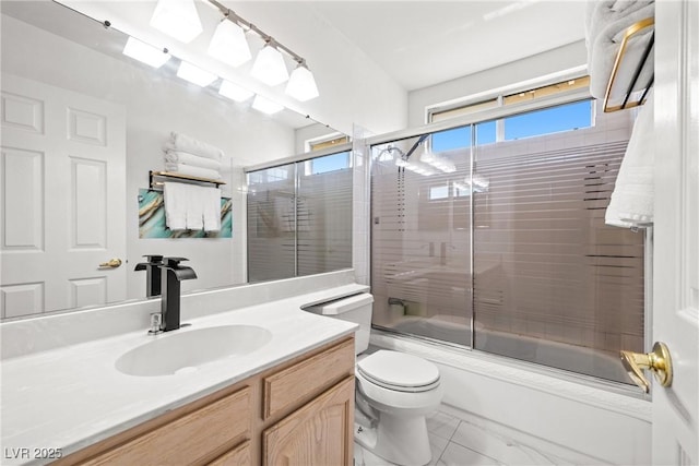 5332 Desert Blossom Rd, Las Vegas, NV 89107 - full bathroom featuring vanity, combined bath / shower with glass door, and marble look tiles