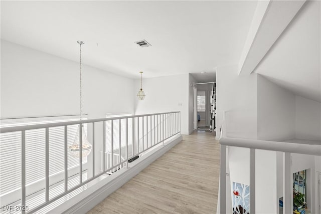 5332 Desert Blossom Rd, Las Vegas, NV 89107 - hall featuring light wood finished floors