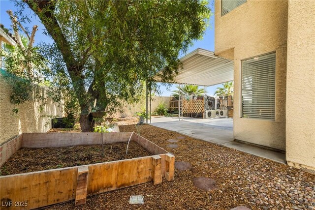 5332 Desert Blossom Rd, Las Vegas, NV 89107 - fenced backyard featuring a patio area