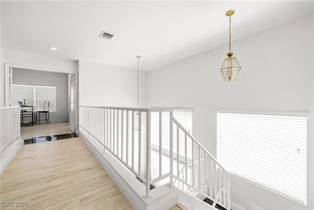 5332 Desert Blossom Rd, Las Vegas, NV 89107 - hall with light wood-style flooring, healthy amount of natural light, and recessed lighting