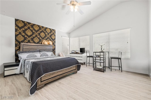 5332 Desert Blossom Rd, Las Vegas, NV 89107 - bedroom with wood finished floors, an office area, ceiling fan, and high vaulted ceiling