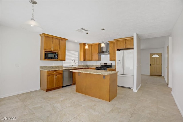 6358 Meadow Lark Ln, Las Vegas, NV 89103 - kitchen featuring appliances with stainless steel finishes, wall chimney exhaust hood, a center island, and brown cabinetry