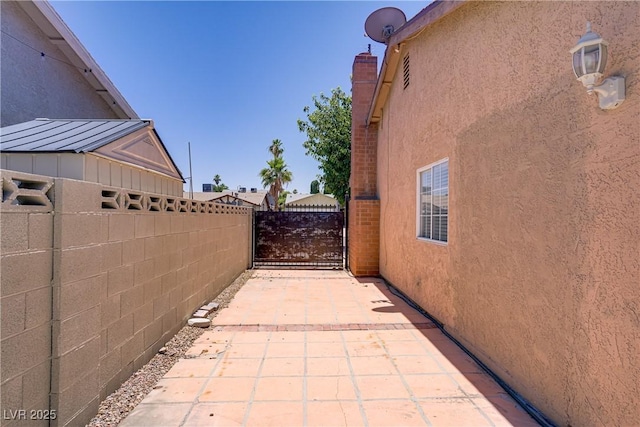 6358 Meadow Lark Ln, Las Vegas, NV 89103 - view of patio / terrace featuring a gate