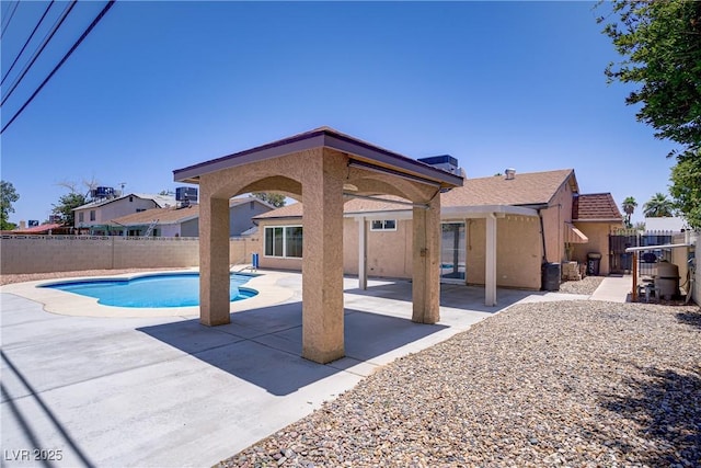 6358 Meadow Lark Ln, Las Vegas, NV 89103 - view of swimming pool with a patio and a fenced backyard