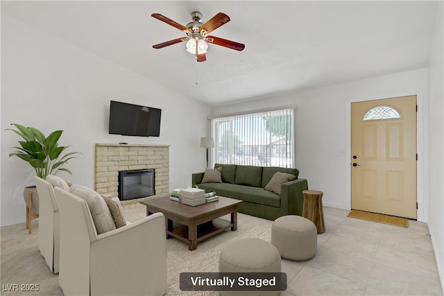 6358 Meadow Lark Ln, Las Vegas, NV 89103 - living area with ceiling fan, vaulted ceiling, healthy amount of natural light, and a fireplace
