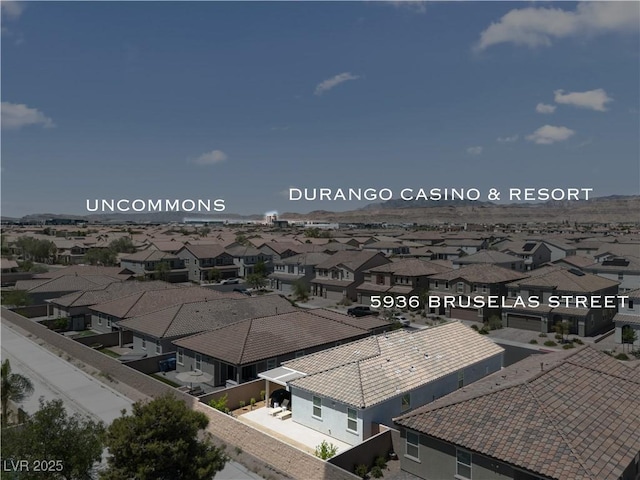 5936 Bruselas St, Las Vegas, NV 89113 - aerial perspective of suburban area featuring a mountain backdrop
