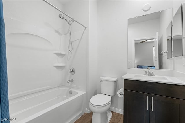 5936 Bruselas St, Las Vegas, NV 89113 - full bathroom with shower / bath combo with shower curtain, wood finished floors, and vanity