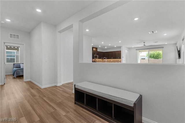 5936 Bruselas St, Las Vegas, NV 89113 - hallway featuring recessed lighting and wood finished floors