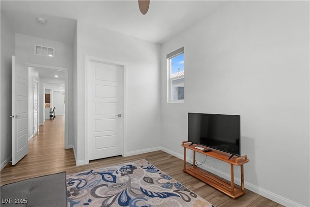 5936 Bruselas St, Las Vegas, NV 89113 - living area with wood finished floors and a ceiling fan