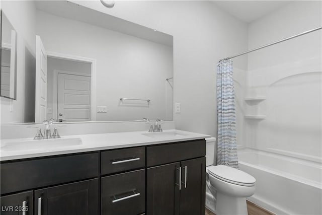 5936 Bruselas St, Las Vegas, NV 89113 - full bath with double vanity, shower / bathtub combination with curtain, and wood finished floors