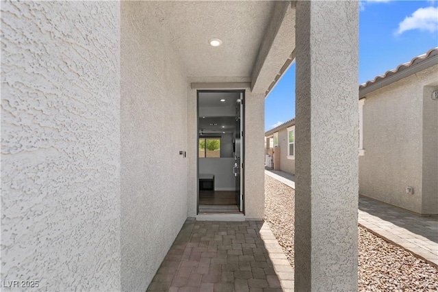 5936 Bruselas St, Las Vegas, NV 89113 - property entrance featuring stucco siding