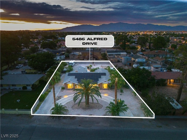 5486 Alfred Dr, Las Vegas, NV 89108 - aerial view at dusk of a mountain view and property parcel outlined