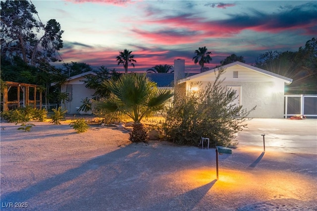 5486 Alfred Dr, Las Vegas, NV 89108 - view of front of home with stucco siding