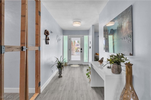 5486 Alfred Dr, Las Vegas, NV 89108 - hall with light wood-type flooring and baseboards