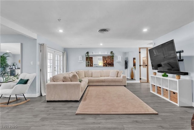5486 Alfred Dr, Las Vegas, NV 89108 - living area featuring recessed lighting, wood finished floors, and french doors