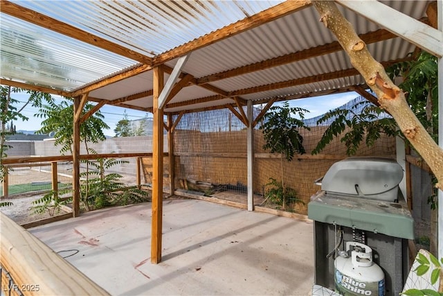 5486 Alfred Dr, Las Vegas, NV 89108 - fenced backyard with a grill and a patio