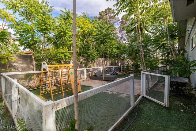 5486 Alfred Dr, Las Vegas, NV 89108 - fenced backyard with a playground