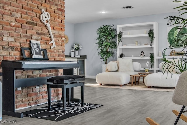 5486 Alfred Dr, Las Vegas, NV 89108 - living area with wood finished floors, a fireplace, and beverage cooler