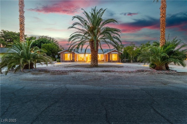 5486 Alfred Dr, Las Vegas, NV 89108 - view of front of home featuring roof mounted solar panels