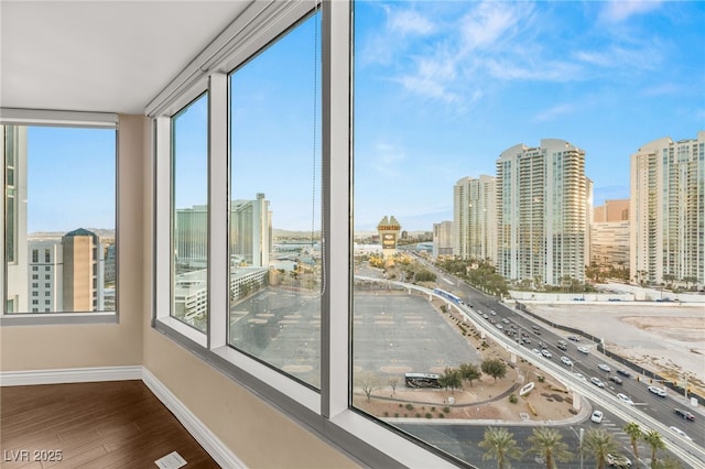 222 Karen Ave Unit 1702, Las Vegas, NV 89109 - unfurnished sunroom featuring a city view
