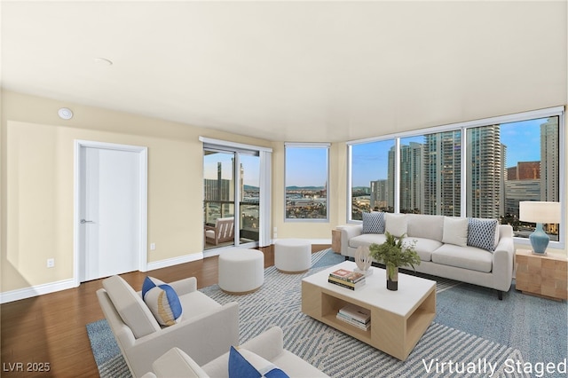 222 Karen Ave Unit 1702, Las Vegas, NV 89109 - living area with wood finished floors and a city view