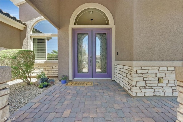 6208 W Rome Blvd, Las Vegas, NV 89131 - view of exterior entry with french doors and stucco siding