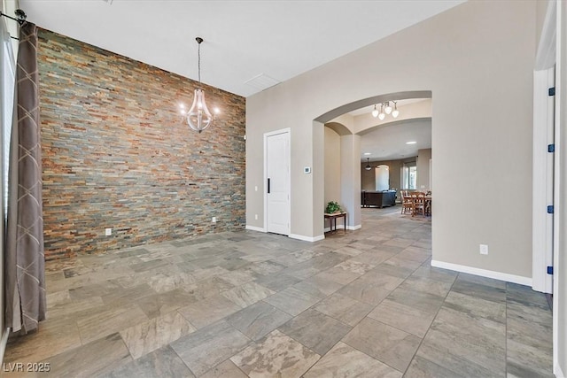 6208 W Rome Blvd, Las Vegas, NV 89131 - unfurnished dining area featuring arched walkways and a chandelier