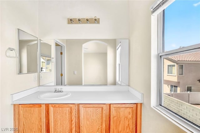 2558 Lazy Saddle Dr, Henderson, NV 89002 - bathroom with healthy amount of natural light and vanity