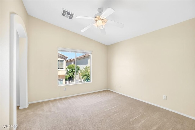 2558 Lazy Saddle Dr, Henderson, NV 89002 - unfurnished room with carpet, lofted ceiling, ceiling fan, and arched walkways