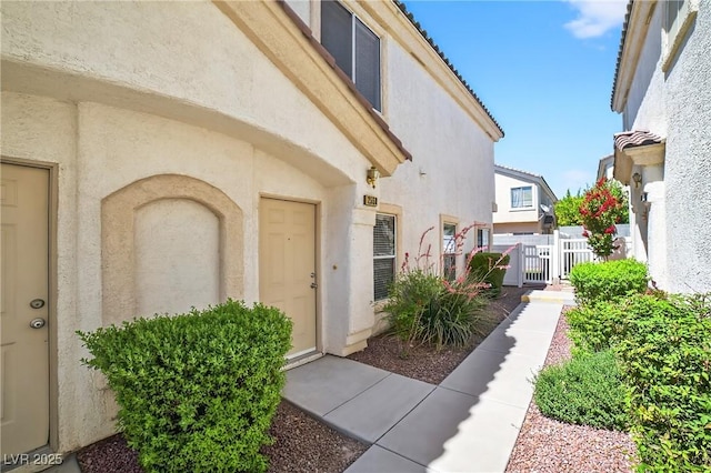 2558 Lazy Saddle Dr, Henderson, NV 89002 - view of exterior entry with stucco siding