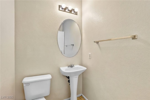 2558 Lazy Saddle Dr, Henderson, NV 89002 - half bath featuring toilet and a sink