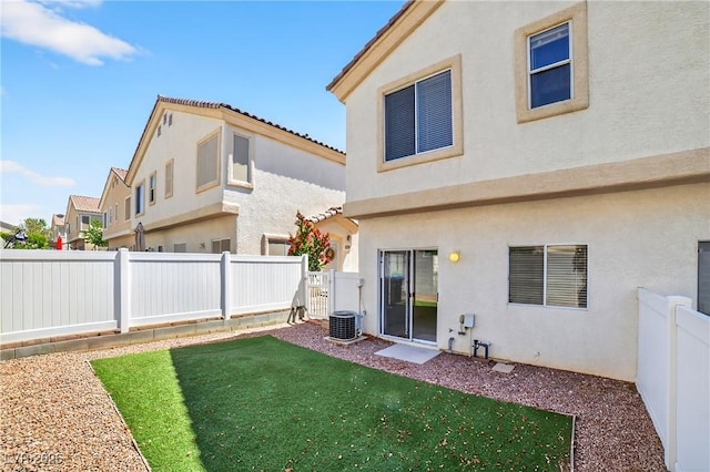 2558 Lazy Saddle Dr, Henderson, NV 89002 - back of property with stucco siding and a fenced backyard