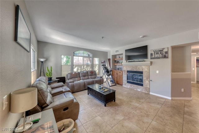 105 Lighthouse Dr Unit 105, Boulder City, NV 89005 - living area featuring a fireplace and light tile patterned floors