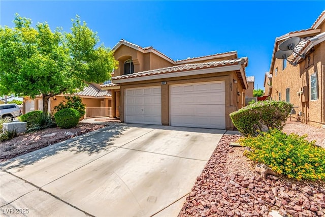8041 Astrology Ct Unit 201, Las Vegas, NV 89128 - view of front of house featuring driveway, stucco siding, a tile roof, and an attached garage