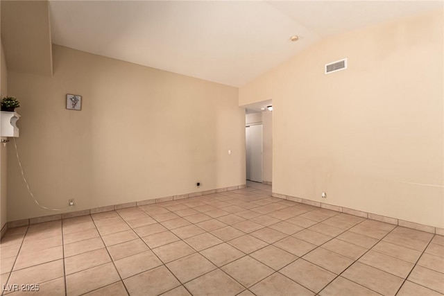 8041 Astrology Ct Unit 201, Las Vegas, NV 89128 - empty room featuring lofted ceiling and light tile patterned floors