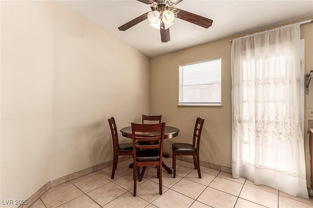 8041 Astrology Ct Unit 201, Las Vegas, NV 89128 - dining room featuring a ceiling fan and light tile patterned flooring