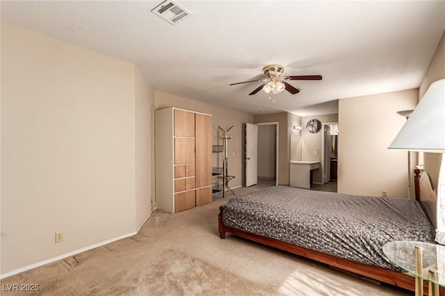 8041 Astrology Ct Unit 201, Las Vegas, NV 89128 - bedroom featuring light colored carpet and a ceiling fan